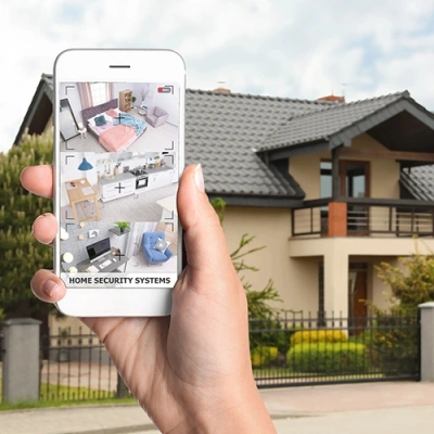 Memphis vivint phone display of cctv live feed in front of a house